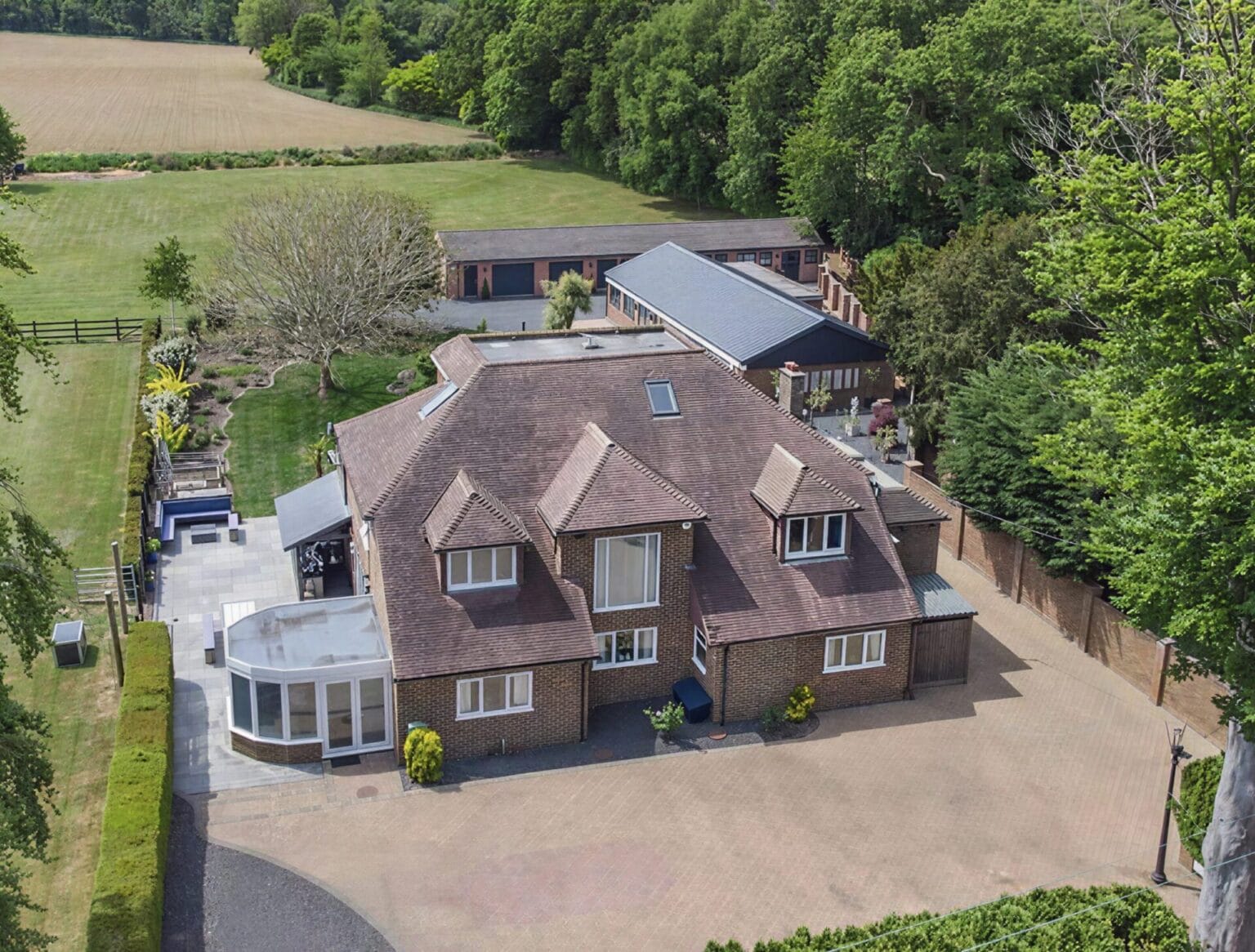Aerial view of a Surrey family home, the kind of project where early interior design input matters most