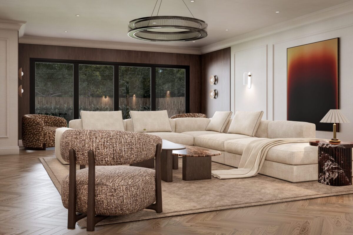 Open plan living room with large sectional sofa and full height glazed doors to the garden, designed by BD Interiors