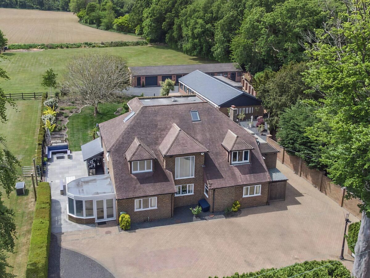 Aerial view of a Surrey family home, the kind of project where early interior design input matters most